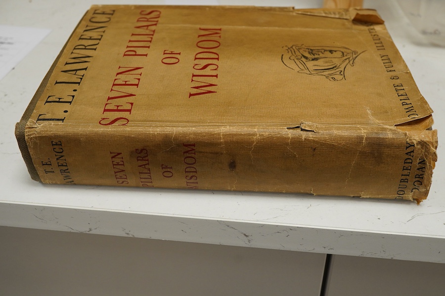 Lawrence, T.E. - Seven Pillars of Wisdom: a triumph. 1st US. trade edition. num. plates (many are portraits by Kennington and others), 6 text illus. and 4 maps (outline colour); publisher's gilt cloth and d/wrapper, roy.